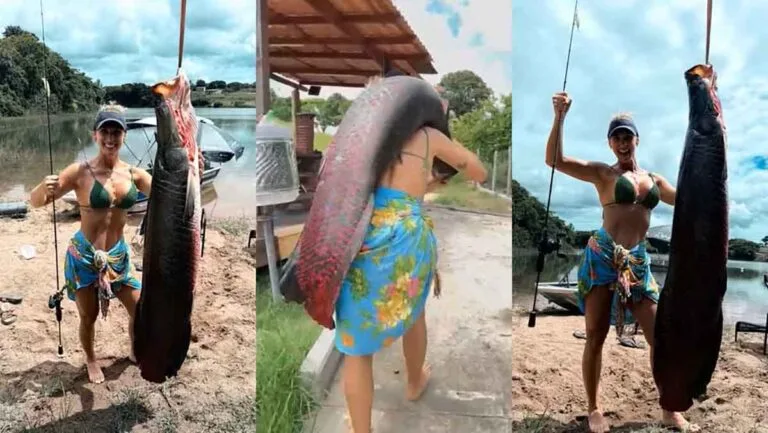 Mulher ao lado de pirarucu de 65 kg pescado na Lagoa do Aguiar, em Linhares, no ES.