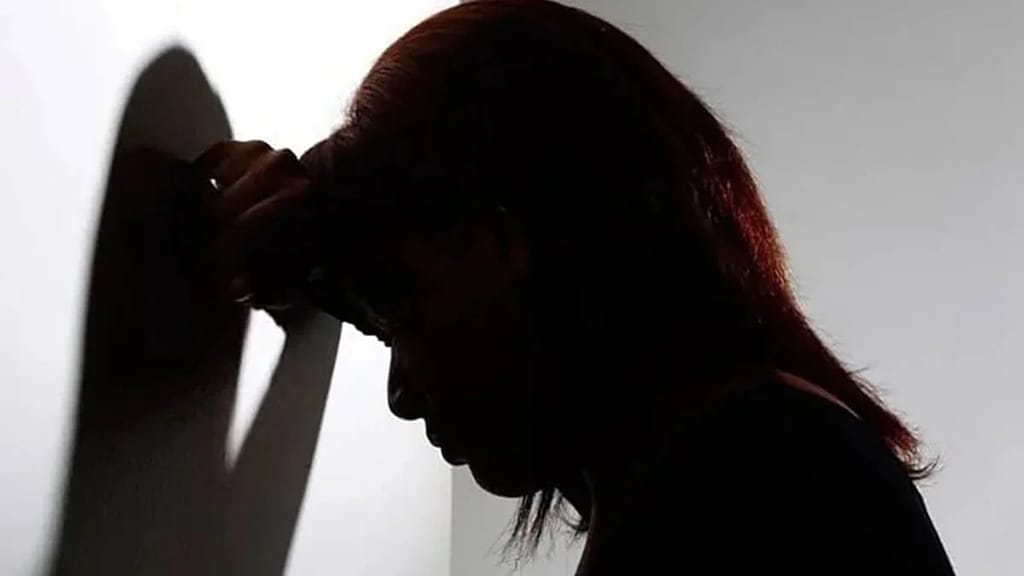 Imagem representa mulher abaldada com a situação de violência doméstica